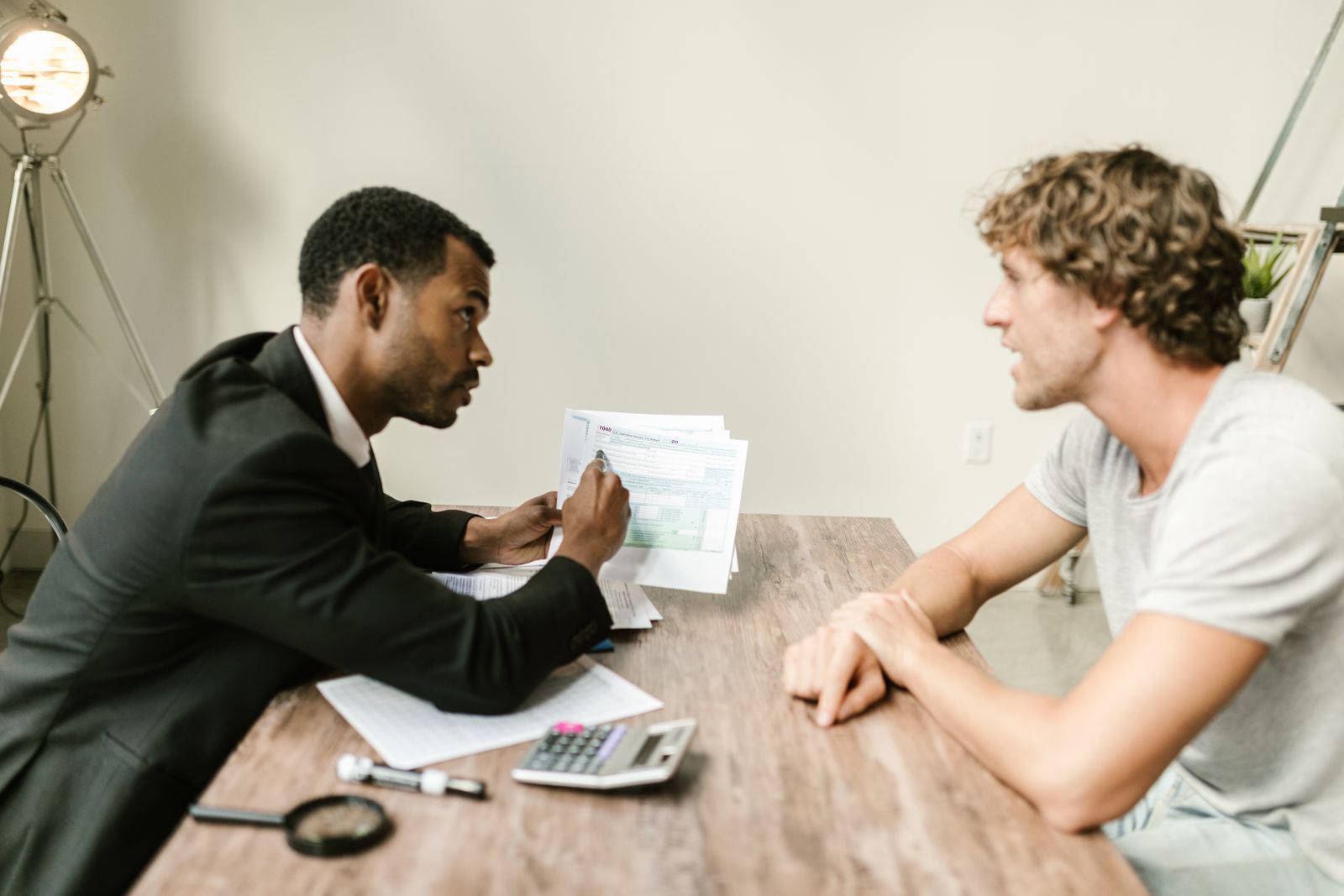 Advisor reviewing a client’s paperwork with them